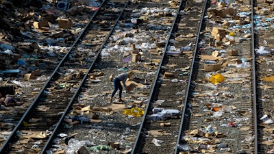 Thieves have been raiding cargo containers aboard trains nearing downtown Los Angeles for months, leaving the tracks blanketed with discarded packages. The sea of debris left behind included items that the thieves apparently didn't think were valuable enough to take, CBSLA reported Thursday.