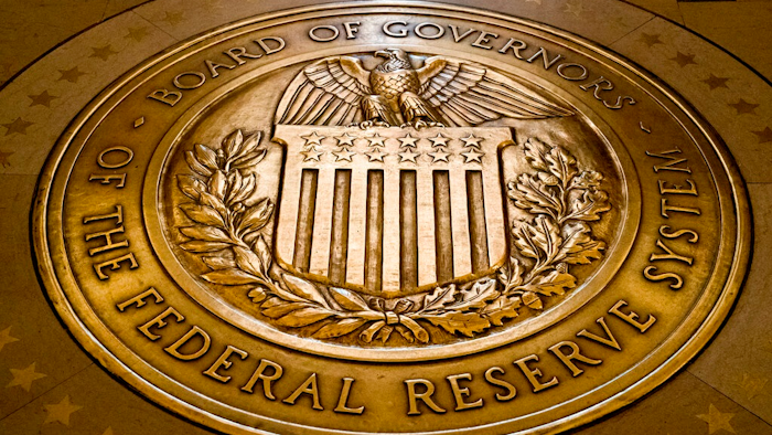 In this Feb. 5, 2018, file photo, the seal of the Board of Governors of the United States Federal Reserve System is displayed in the ground at the Marriner S. Eccles Federal Reserve Board Building in Washington. Federal Reserve Governor Christopher Waller said Thursday, Feb. 24, 2022 he is willing to support a half-point interest rate hike at the central bank's next meeting in March if upcoming data suggests inflation is worsening.