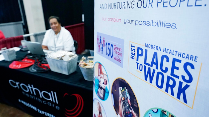 Employers manned booths with banners promoting their companies benefits, free logo branded swag and listed salary pay scales and in some cases recruitment bonuses in order to entice job applicants to approach their booths during the Lee County Area Job Fair in Tupelo, Miss., Tuesday, Oct. 12, 2021. The number of Americans collecting unemployment benefits fell to a 52-year low after another decline in jobless aid applications last week. Jobless claims fell by 17,000, from 249,000 to 232,000 for the week ending Feb. 19, the Labor Department reported Thursday, Feb. 24, 2022.