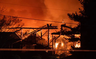 A structure fire burns at the Weaver Fertilizer Plant on Monday, Jan. 31, 2022, in Winston-Salem, N.C.