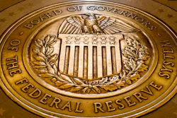 In this Feb. 5, 2018, file photo, the seal of the Board of Governors of the United States Federal Reserve System is displayed in the ground at the Marriner S. Eccles Federal Reserve Board Building in Washington. Federal Reserve Governor Christopher Waller said Thursday, Feb. 24, 2022 he is willing to support a half-point interest rate hike at the central bank's next meeting in March if upcoming data suggests inflation is worsening.