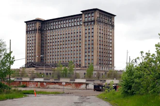 Exterior view of the Michigan Central train depot, shown May 23, 2019, in Detroit. Ford Motor Co. announced Friday, Feb. 4, 2022, that Google is joining the automaker's effort to transform a once-dilapidated Detroit train station into a research hub focused on electric and self-driving vehicles.