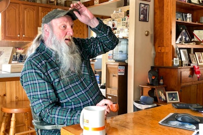 Ray Kemble talks about his water issues in his home in Dimock, Pa., Feb. 14, 2022. Kemble recently met with officials in the Pennsylvania attorney general's office regarding the criminal case against a gas driller charged with polluting Dimock's groundwater with methane. Faulty gas wells drilled by Cabot Oil & Gas were blamed for leaking methane into the groundwater in Dimock, in one of the best-known pollution cases ever to emerge from the U.S. drilling and fracking boom.