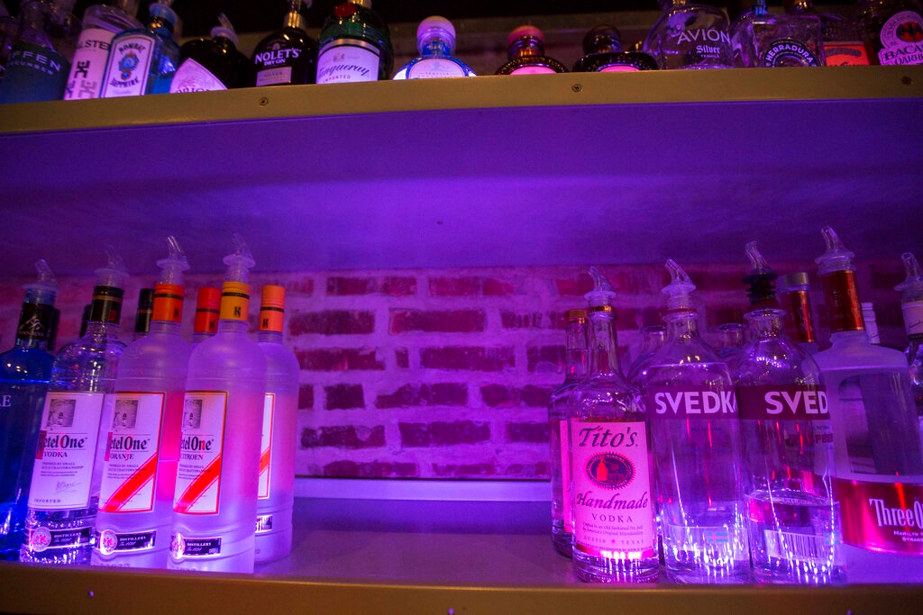 An empty space on a liquor shelf where Russian vodka used to be located at The Sidetrack, a gay bar on the north side of Chicago, July 29, 2013. The United States and Europe are slapping official sanctions on Russian banks and tech companies. But bars and liquor stores across America and Canada have found another way to punish Russia for invading Ukraine: They’re pulling Russian vodka off their shelves and promoting Ukrainian brands instead.