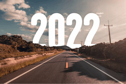 The Word 2022 Behind The Tree Of Empty Asphalt Road At Golden Sunset And Beautiful Blue Sky 1300086148 2125x1417 (1)