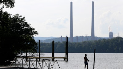 The largest public power company in the U.S. is launching a program to develop and fund new small modular nuclear reactors as part of its strategy to dramatically reduce greenhouse gas emissions.