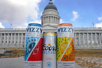 A can of Coors Seltzer Mango, center, is shown with Vizzy Blueberry Pomegranate, left, and Vizzy Pineapple Mango, in front of the Utah State Capitol on Feb. 17, 2022, in Salt Lake City.