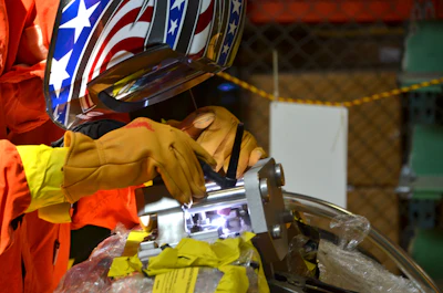 Tony Wease performs precision welds on a core component of INL’s Advanced Test Reactor during the reactor’s core overhaul which was completed this week.