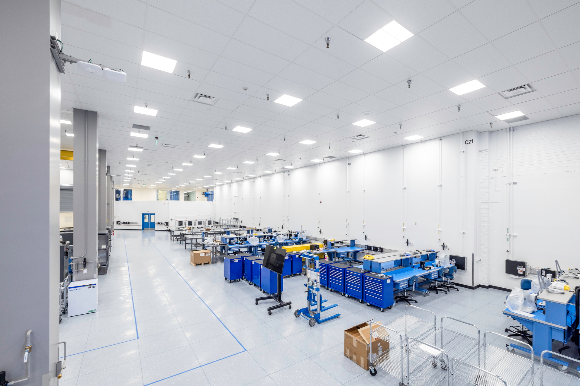 Digitally-defined small satellite factory incorporates model-based systems engineering, digital design engineering, and design for manufacturability within a modular footprint equipped to build small satellites for different security levels.