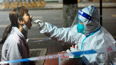 China's new COVID-19 cases Tuesday more than doubled from the previous day as it faces by far its biggest outbreak since the early days of the pandemic.