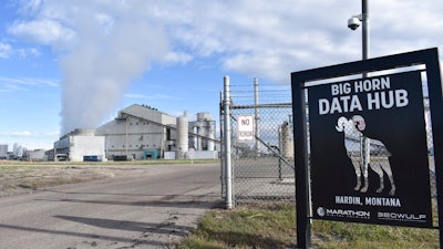 The Hardin Generating Station, a coal-fired power plant that is also home to the cryptocurrency 'mining' operation Big Horn Data Hub, is seen on April 20, 2022, in Hardin, Mont. Energy from burning coal is used to power thousands of computers that are kept on site to produce the digital currency known as bitcoins.