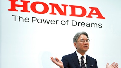 Honda Motor Co. Chief Executive Toshihiro Mibe answers questions from media during a press conference Tuesday, April 12, 2022, in Tokyo.