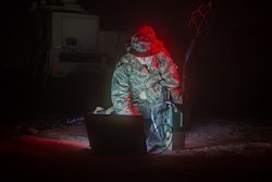 A U.S. military transmissions system operator establishes communications using a multi-band-networking-manpack. The Protected Tactical Enterprise Service (PTES) will provide ground-based Protected Tactical Waveform (PTW) processing, enabling secure operations and protected tactical communications coverage over Wideband Global SATCOM (WGS) satellites.