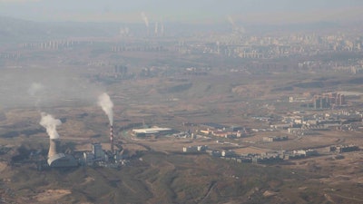 China is promoting coal-fired power as the ruling Communist Party tries to revive a sluggish economy, prompting warnings that Beijing is setting back efforts to cut climate-changing carbon emissions from the biggest global source.