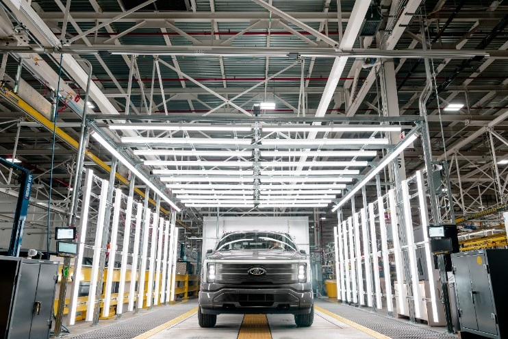 The F-150 Lightning is being produced in the first Ford plant without traditional in-floor conveyor lines, which instead uses robotic Autonomous Guided Vehicles.