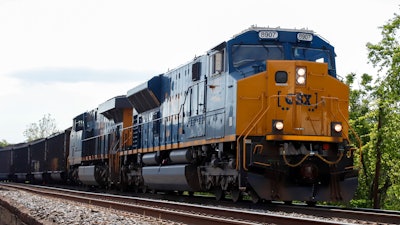A CSX freight train pulls through McKeesport, Pa., on Tuesday, June 2, 2020. CSX has agreed, Tuesday, April 19, 2022, to start paying some of its employees more in advance of raises the railroad expects to agree to as part of ongoing national contract talks.
