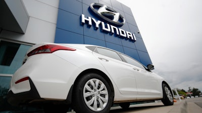An unsold 2019 Accent sedan sits at a Hyundai dealership in Littleton, Colo. on Sunday, May 19, 2019. Korean automaker Hyundai is recalling 239,000 cars because the seat belts can explode and injure vehicle occupants. The recall, which expands and replaces three previous recalls, includes 2019-2022 Accents, 2021-2023 Elantras and 2021-2022 Elantra HEVs, or hybrid electric vehicles. Owners will be able to take their recalled vehicles to dealerships where the seat belt pretensioners will be fit with a cap at no cost.