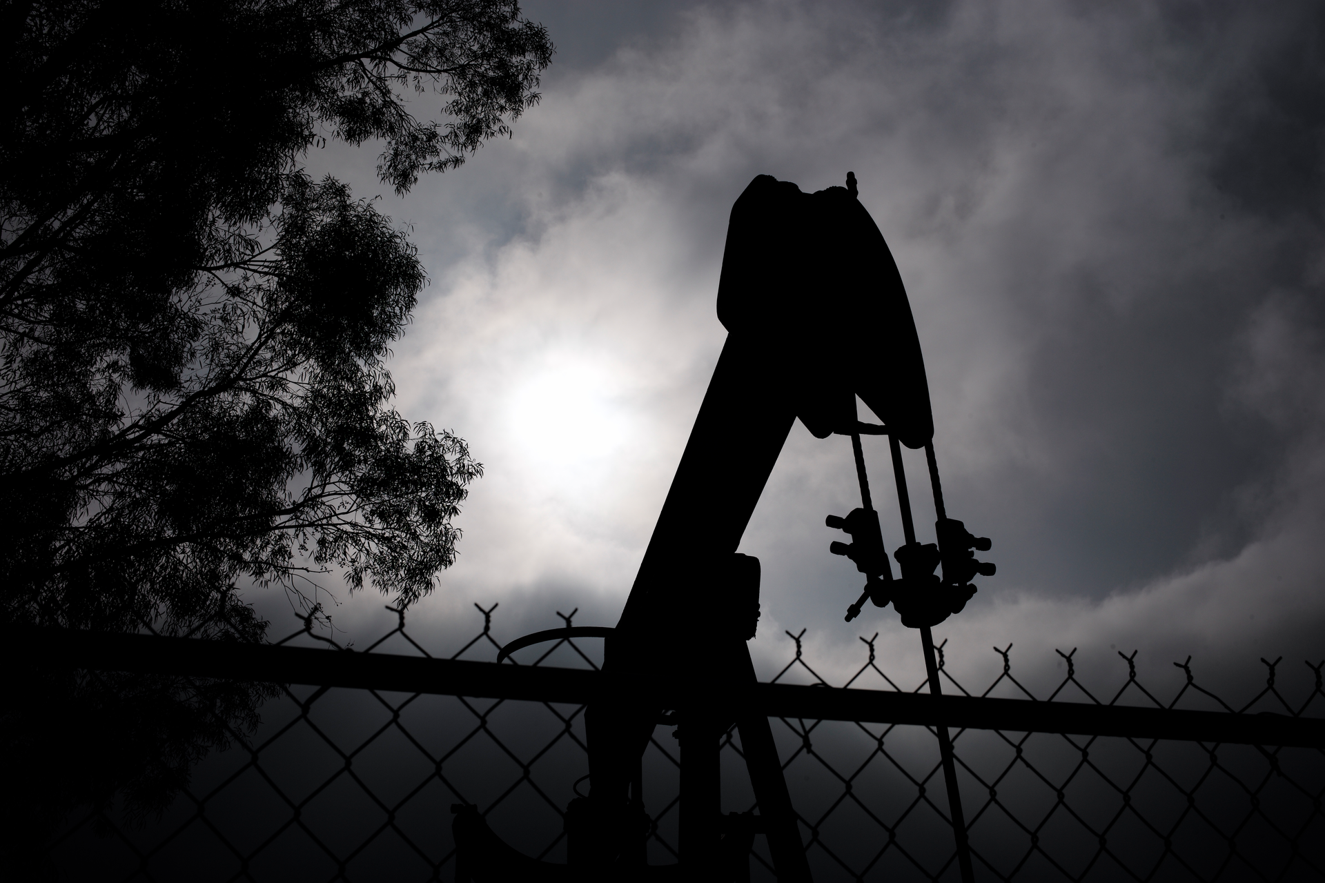 A pumpjack operates on Jan. 15, 2015, in Bakersfield, Calif. Residents of Bakersfield are concerned about potential explosions after a state agency found that six idle oil wells near homes were leaking methane in the past several days.