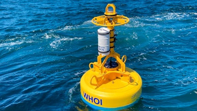 An acoustic buoy floats in the water off the coast of Ocean City, Md., June 29, 2021.