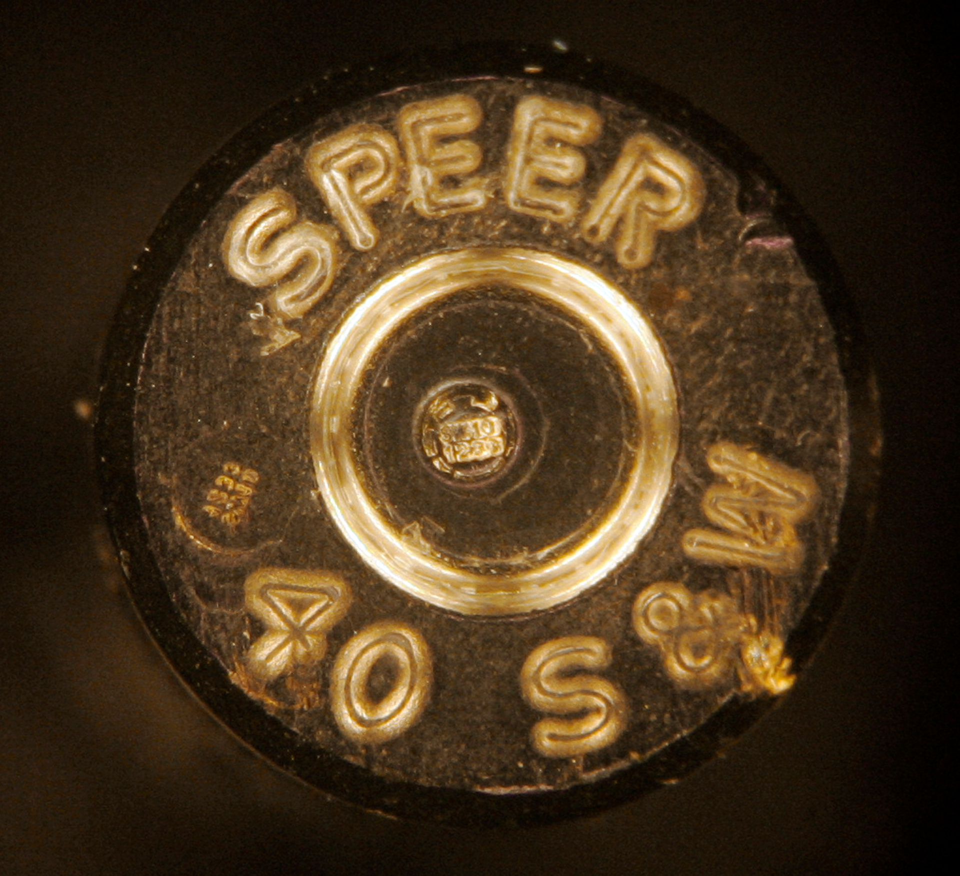 A bullet casing showing identification codes, at center, is shown through a microscope at a news conference at the Los Angeles Police Academy, Aug. 14, 2007. New York Gov. Kathy Hochul signed 10 public safety-related bills, Monday, June 7, 2022, including one that will require microstamping in new firearms, which could help law enforcement solve gun-related crimes.