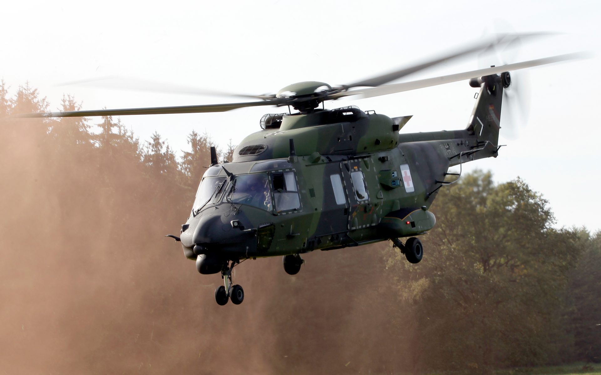 A NH90 multipurpose helicopter takes off during a demonstration event held for the media by the German Bundeswehr in Bergen near Hannover, Germany, Wednesday, Sept. 28, 2011. NATO-member Norway has terminated its contract for 14 NH90 helicopters, citing delays, errors, time-consuming maintenance, will return all choppers while demanding full refund of the nearly 5 billion ($525 million) kroner, the defense minister said Friday, June 10, 2022.