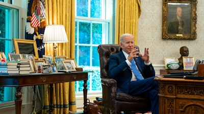 President Joe Biden speaks during an interview with the Associated Press in the Oval Office of the White House, Thursday, June 16, 2022, in Washington.