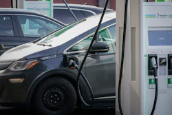 An electric Chevrolet Bolt charges at an Electrify America site in Lakewood, Colo., on Dec. 21, 2020. In Connecticut, officials have begun rolling out a wide-ranging new law aimed at reducing vehicle emissions, including adding 10 more electric vehicles that will now be eligible for the state's rebate program.