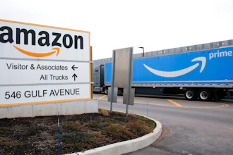 An Amazon Prime truck passes by a sign outside an Amazon fulfillment center on Staten Island, New York, on March 19, 2020. Amazon is heading into its annual Prime Day sales event on Tuesday, July 12, 2022, much differently than how it entered the pandemic. Once the darling of the pandemic economy, the company posted a rare quarterly loss in April as well as its slowest rate of revenue growth in nearly two decades at 7%.