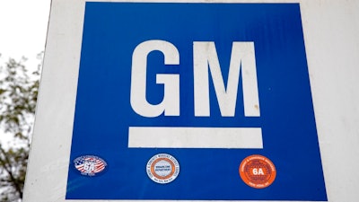 A General Motors sign is seen at its facility in Langhorne, Pa., on Oct. 16, 2019. General Motors' second-quarter net income fell 40% from a year ago as computer chip and parts shortages hobbled factory output and drove the company's U.S. sales down more than 15%. The Detroit automaker said it made $1.67 billion from April, 2022, through June, 2022, in part because it couldn't deliver 95,000 vehicles during the quarter because they were built without one part or another.