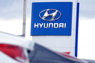 The Hyundai company logo hangs over a long row of cars at a car dealership in Centennial, Colo., Sunday, Dec. 20, 2020. Georgia officials are close to finalizing a deal with the automaker to build a $5.5 billion electric car plant near Savannah, Ga. An economic development agency representing four Savannah-area counties approved its portions of the agreement Tuesday, July 19, 2022, including an economic incentives package.