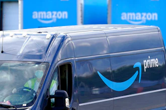 An Amazon Prime logo is seen on the side of a delivery van as it departs an Amazon Warehouse location on Oct. 1, 2020, in Dedham, Mass. Amazon will be offering discounts on a variety of items during its two-day Prime Day shopping event that began Tuesday, July 12, 2022. Consumers are searching for the best deals they can find, including time-sensitive deals that are offered on the site for a short period of time.