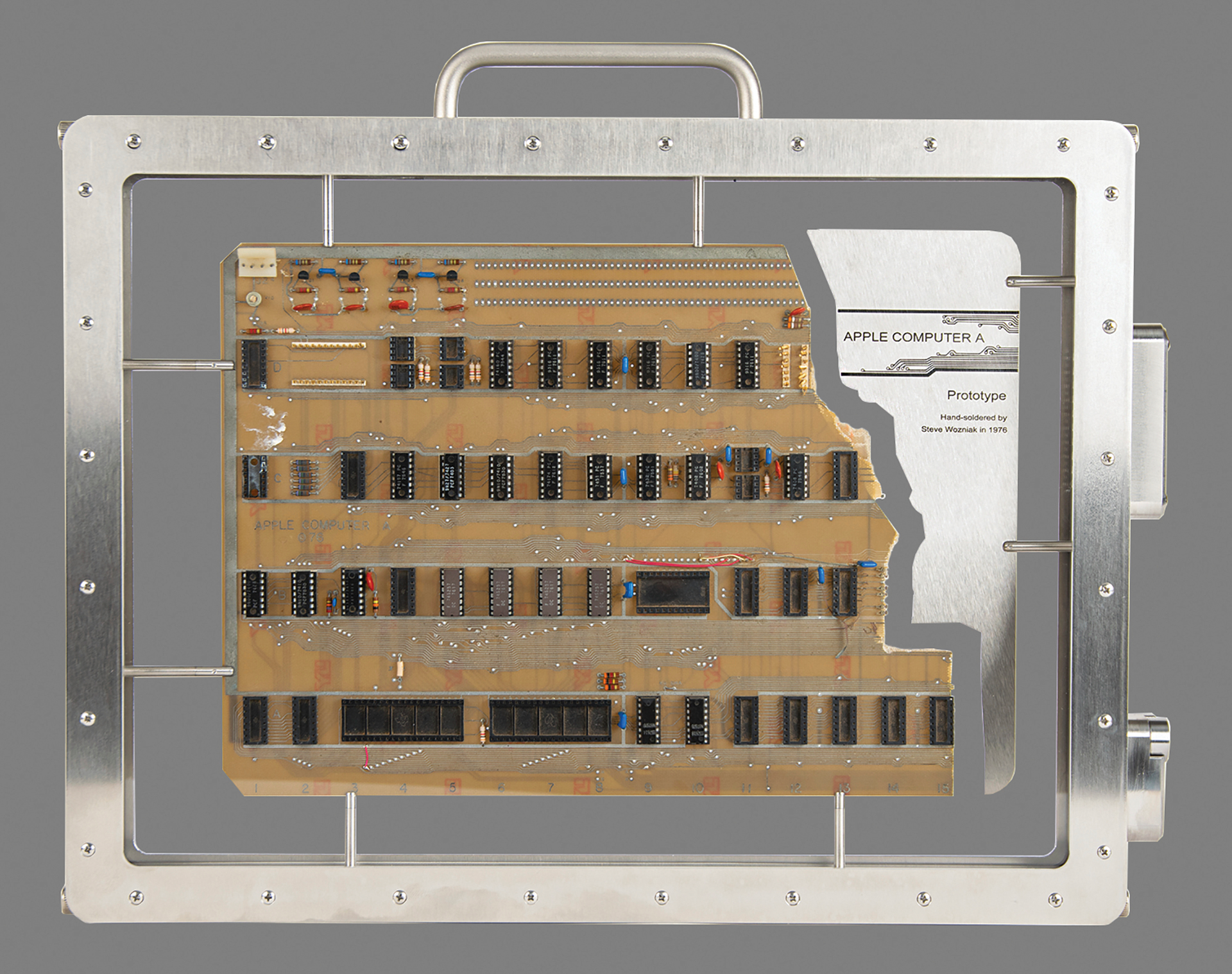 This image provided by Boston-based RR Auction, shows an authenticated Apple-1 Computer prototype from the mid-1970s that a Bay Area collector, who wishes to remain anonymous, made the winning $677,196 bid on Thursday, Aug. 18, 2022, the auctioneer said.