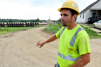 Taylor Purdy, a pipe layer with Complete General Construction, answers questions about his experience working around the new Intel semiconductor manufacturing plant construction site in Johnstown, Ohio.