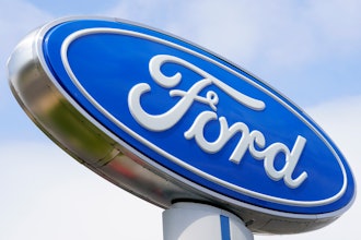 A Ford sign is shown at a dealership in Springfield, Pa., Tuesday, April 26, 2022.