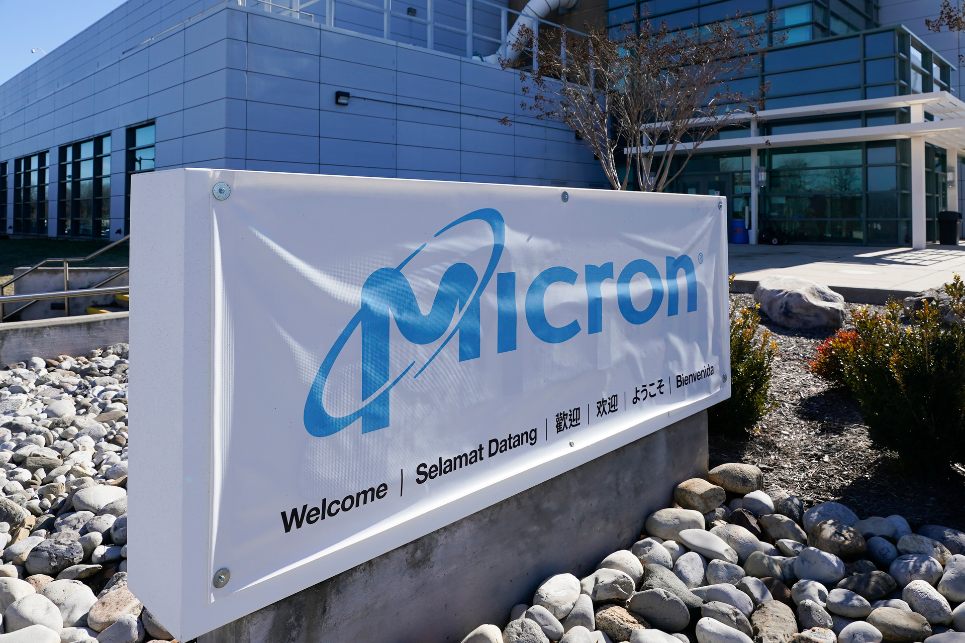 A sign marks the entrance of the Micron Technology automotive chip manufacturing plant on Feb. 11, 2022, in Manassas, Va.