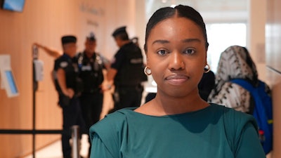 Bahia Bakari, the sole survivor of the Yemeni airline that crashed into the Indian Ocean in 2009, arrives at the courtroom, Wednesday, Sept. 14, 2022 in Paris. A French court was expected to issue a verdict Wednesday Sept.22, 2022 in the trial of the Yemeni airline that operated a passenger plane that crashed into the Indian Ocean in 2009, killing 152 people.