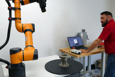 Phil Rediger running the GOM ScanCobot