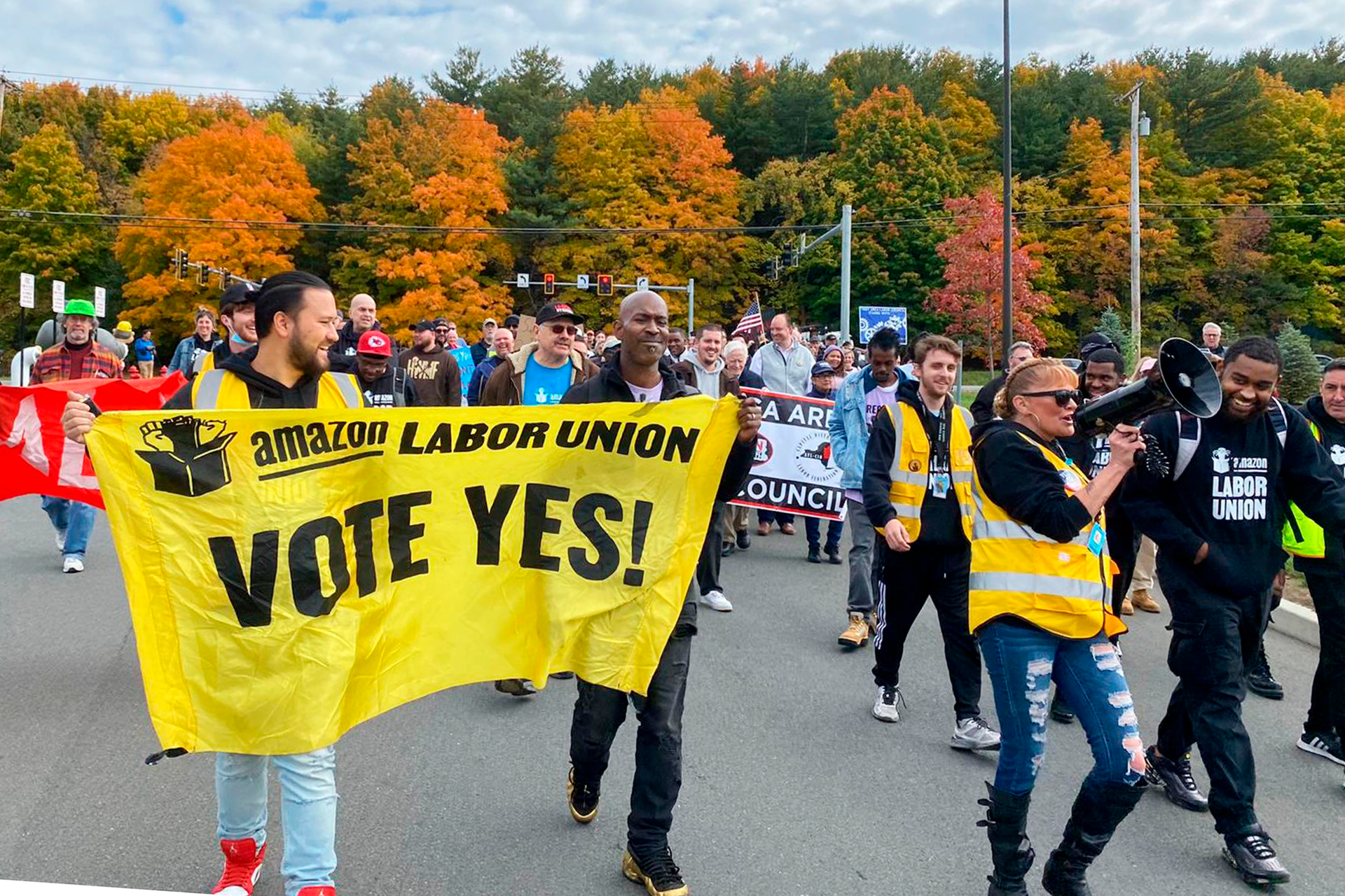 Amazon workers and supporters march during a rally in Castleton-On-Hudson, about 15 miles south of Albany, N.Y., Monday, Oct. 10, 2022.