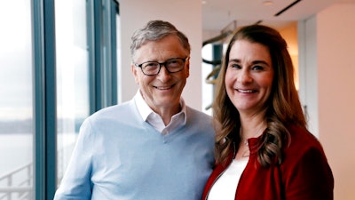 In this Feb. 1, 2019 photo, Bill and Melinda Gates pose for a photo in Kirkland, Wash. The Bill & Melinda Gates Foundation announced Wednesday, Oct. 19, 2022 that it is making grants of more than a $1 billion as part of a sweeping national plan to improve math education over the next four years to help students land well-paying jobs when they graduate, given research that shows the connection between strong math skills and career success.