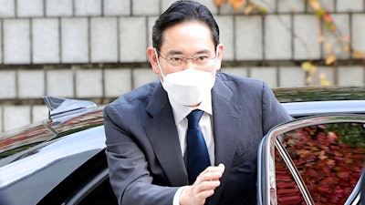 Samsung Electronics Chairman Lee Jae-yong gets out of a car upon his arrival at the Seoul Central District Court in Seoul, South Korea, Thursday, Oct. 27, 2022. Samsung Electronics has officially appointed third-generation heir Lee Jae-yong as executive chairman, two months after he secured a pardon of his conviction for bribing a former president in a corruption scandal that toppled a previous South Korean government.