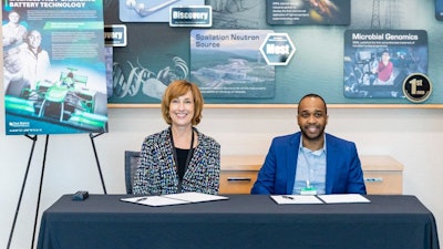 Susan Hubbard, ORNL’s deputy for science and technology, and Ricardo Marc-Antoni Duncanson, founder of Marc-Antoni Racing, celebrated the company's licensing of ORNL-developed technologies during an event Oct. 17.
