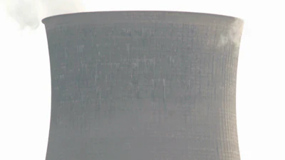 A tower for the Gen. James Gavin power plant is seen in Cheshire, Ohio, on April 16, 2002.