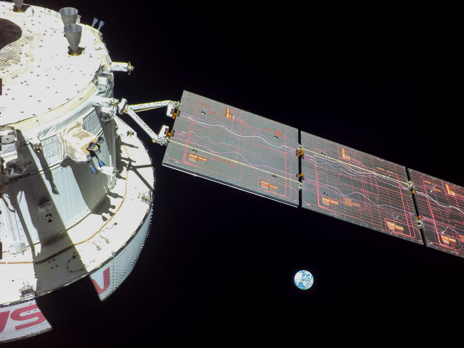 This image provided by NASA shows flight Day 9 imagery that NASA's Orion spacecraft captured looking back at the Earth from a camera mounted on one of its solar arrays.