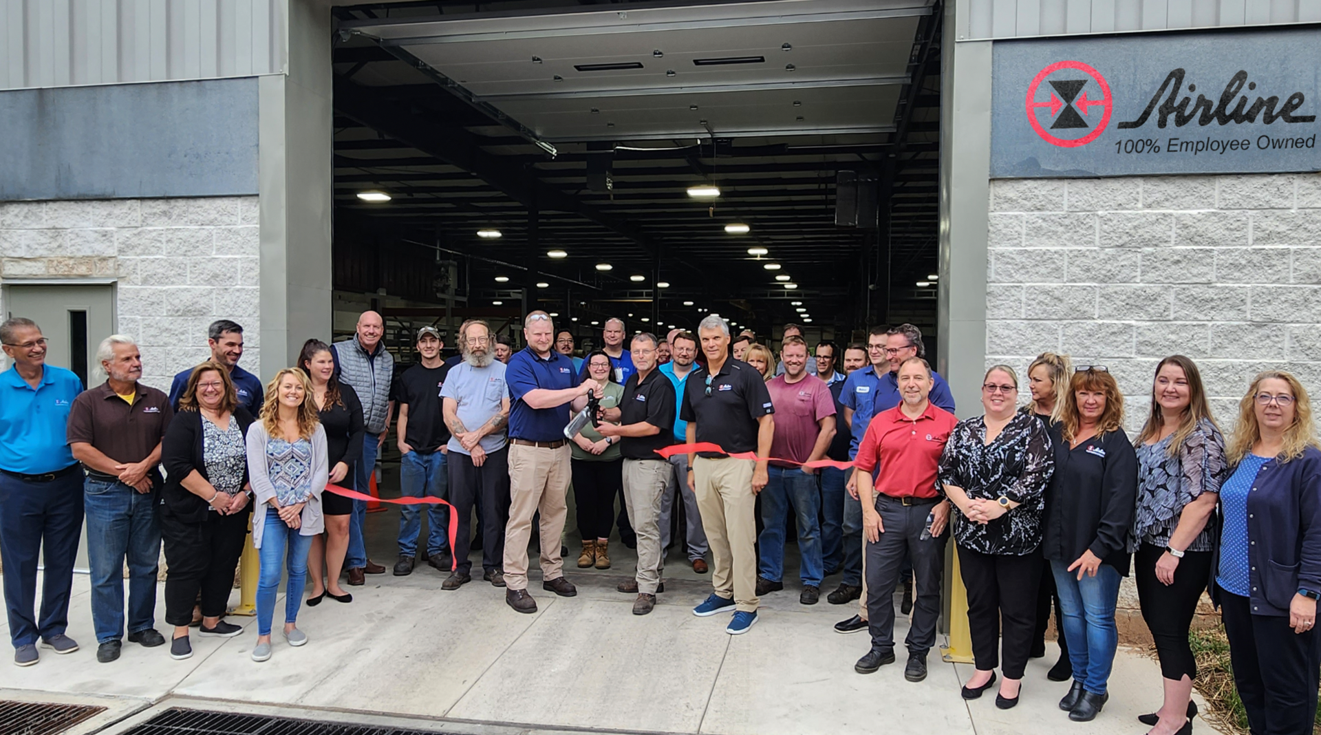 Chris Barry, manufacturing general manager, Michael Petry, production manager, Mark Steffens, Airline CEO, and other key staff members at an internal ribbon cutting ceremony at the new location, York, Pa.