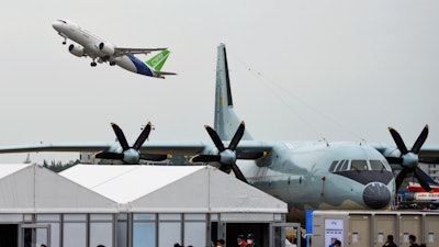 China's domestically made C919 passenger jet takes off during the 14th China International Aviation and Aerospace Exhibition in Zhuhai in southern China's Guangdong province, Tuesday, Nov. 8, 2022.