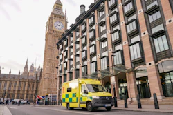 An ambulance is parked outside Portcullis House, backdropped by the Elizabeth Tower, commonly known as Big Ben, in London, Thursday, Dec. 1, 2022.