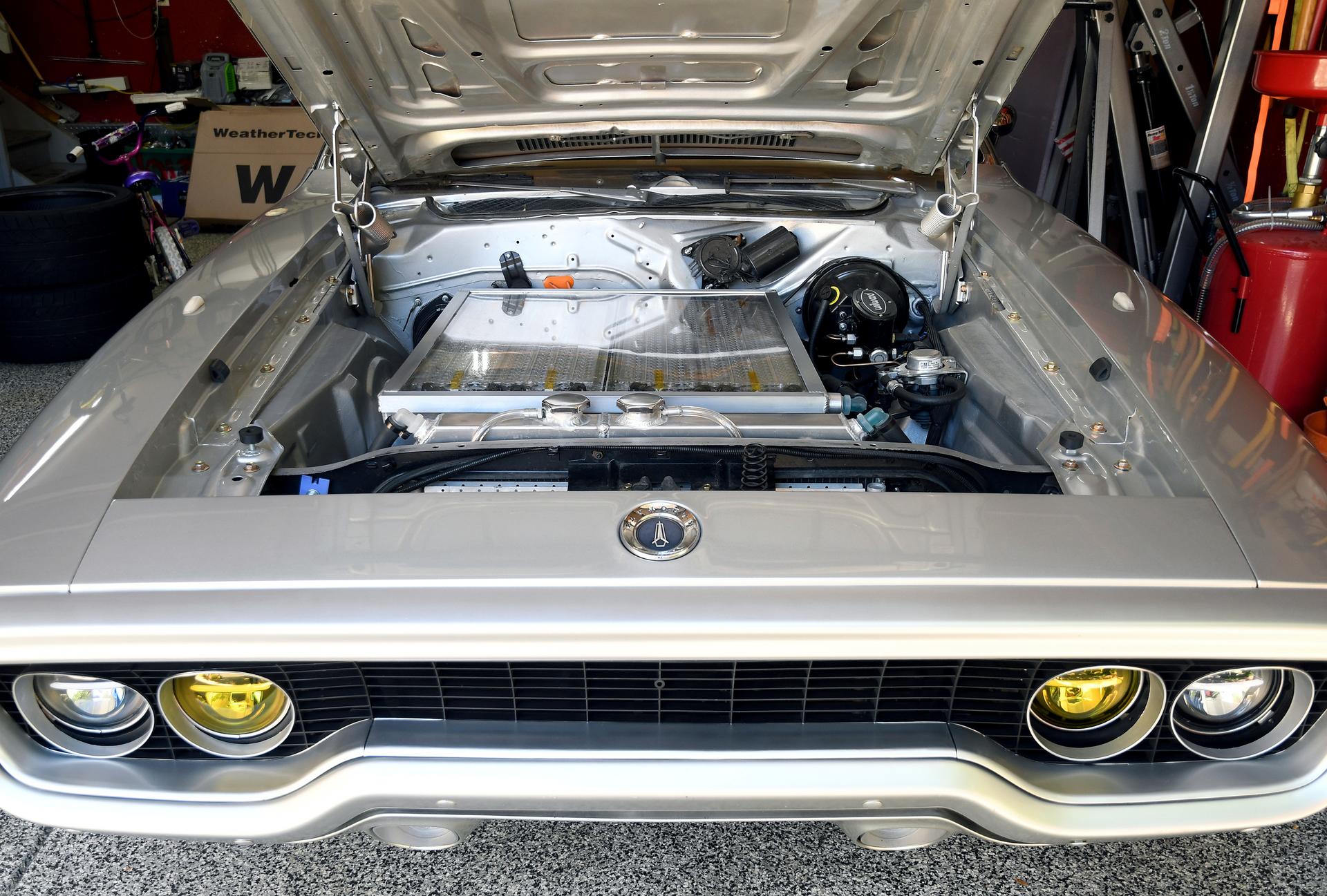 Racers, Mechanics, Tinkerers Converting Classic Cars to EVs - Vimarsana News