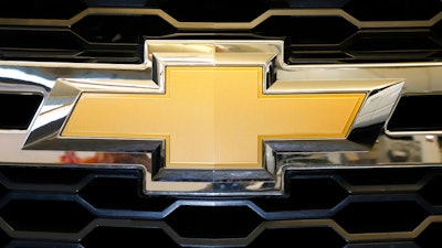 The Chevrolet logo is displayed at the 2020 Pittsburgh International Auto Show Thursday, Feb.13, 2020 in Pittsburgh. General Motors is recalling more than 825,000 SUVs and cars in the U.S. and Canada, Wednesday, Dec. 14, 2022, because the daytime running lights may not turn off when the headlights are on. The recall covers certain 2022 and 2023 Cadillac Escalade, Chevrolet Silverado 1500, Chevrolet Suburban and Tahoe, GMC Sierra 1500, and GMC Yukon SUVs. Also included are Cadillac CT4s and CT5s from the 2020 to 2023 model years, as well as Buick Envisions from 2021 to 2023.