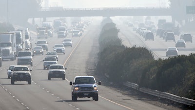 Traffic moves along along 99 south in Fresno, Calif., Dec. 28, 2017.