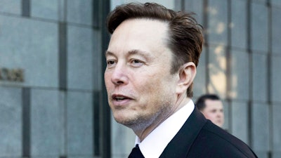 Elon Musk departs the Phillip Burton Federal Building and United States Court House in San Francisco on Jan. 24, 2023.